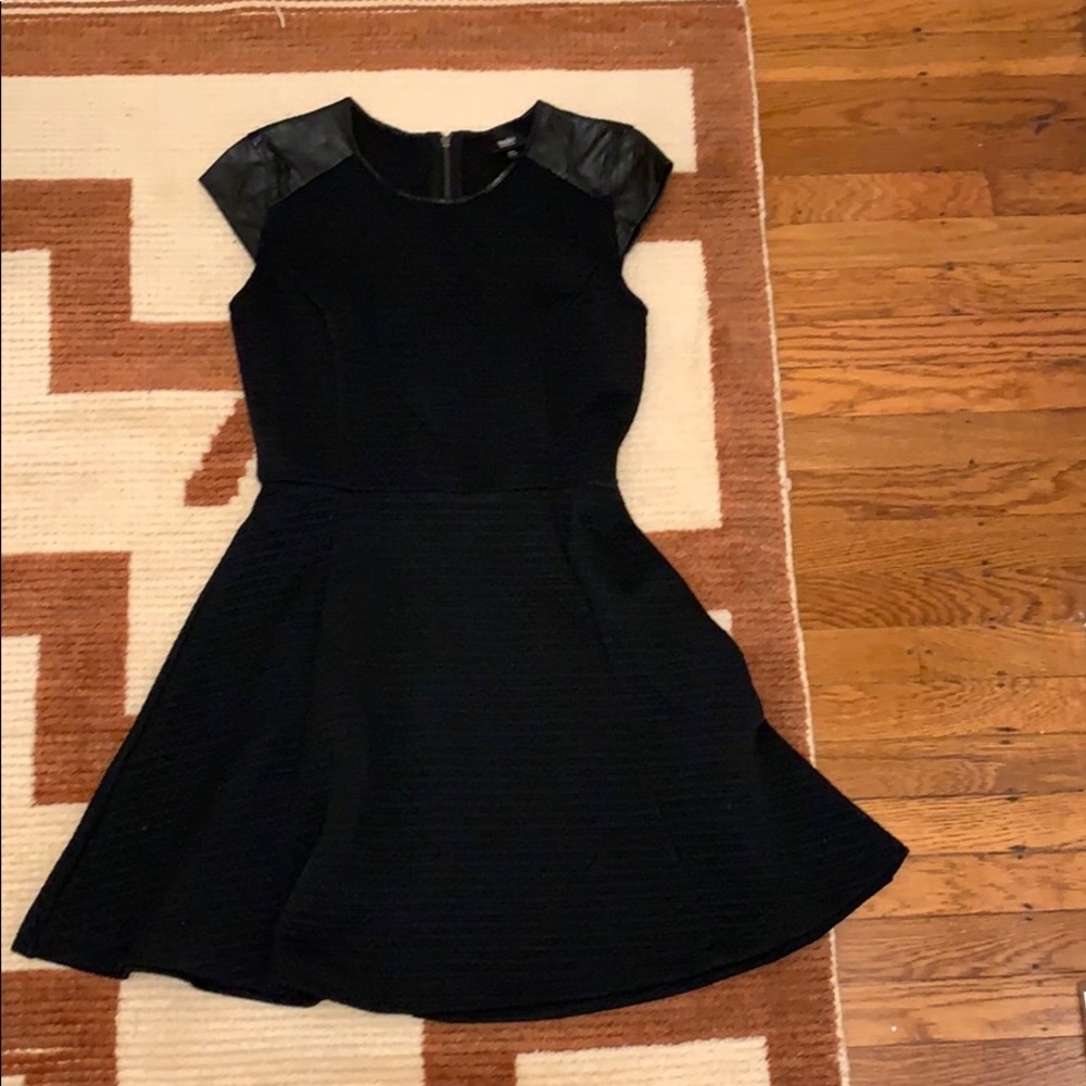 Black textured dress with leather cap sleeve
